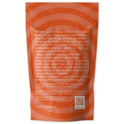 Vibrant orange resealable bag containing magic mushrooms, featuring a circular design and product information on the front.