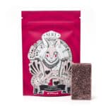 Purple packaging with a whimsical rabbit illustration, psilocybin gummy in front, labeled as Cherry flavor, 1000mg dosage.